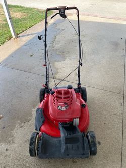 Working Self-Propelled Lawnmower