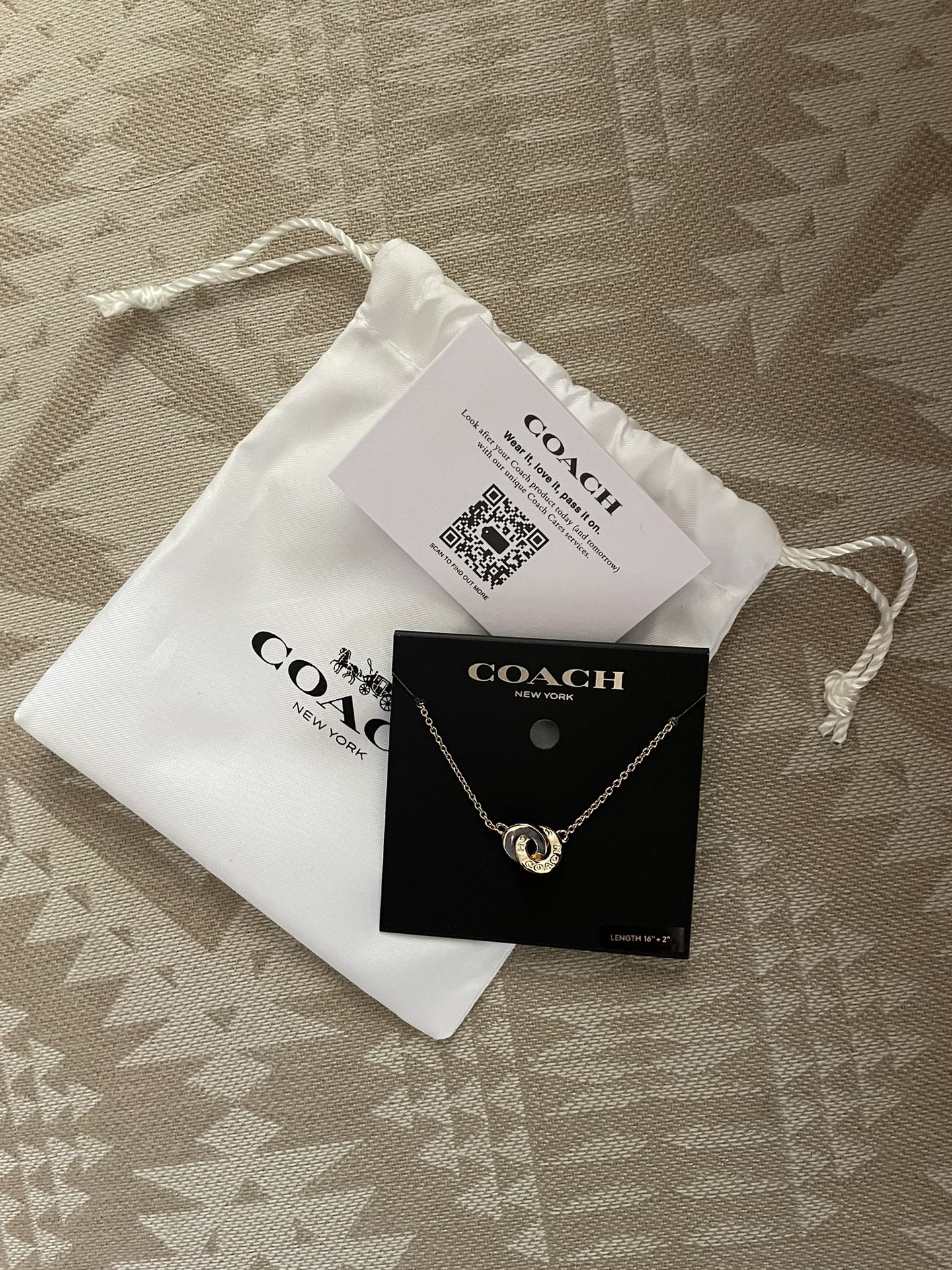 Coach gold necklace