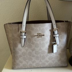 Coach tan and white signature tote bag