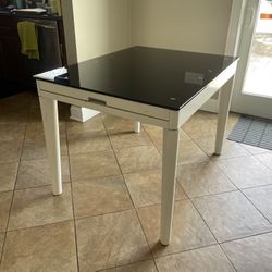 Tempered glass and wood dining table
