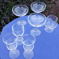 7 WINE GLASSES,  DIFFERENT SIZES 