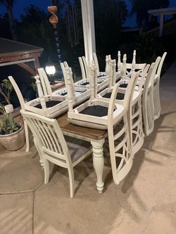 Dining room table and 10 chairs