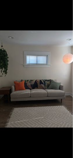 Living Spaces Couch - stone / cream color