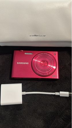 Hot pink Samsung MV900F digital camera