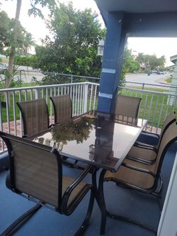 Patio table and 4 patio chairs