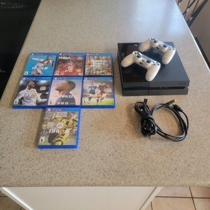 500GB PS4 with 2 wireless controllers, chords and 7 Games.. NOT SEPERATING.