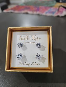 New Silver 2 pair earing in box never used
