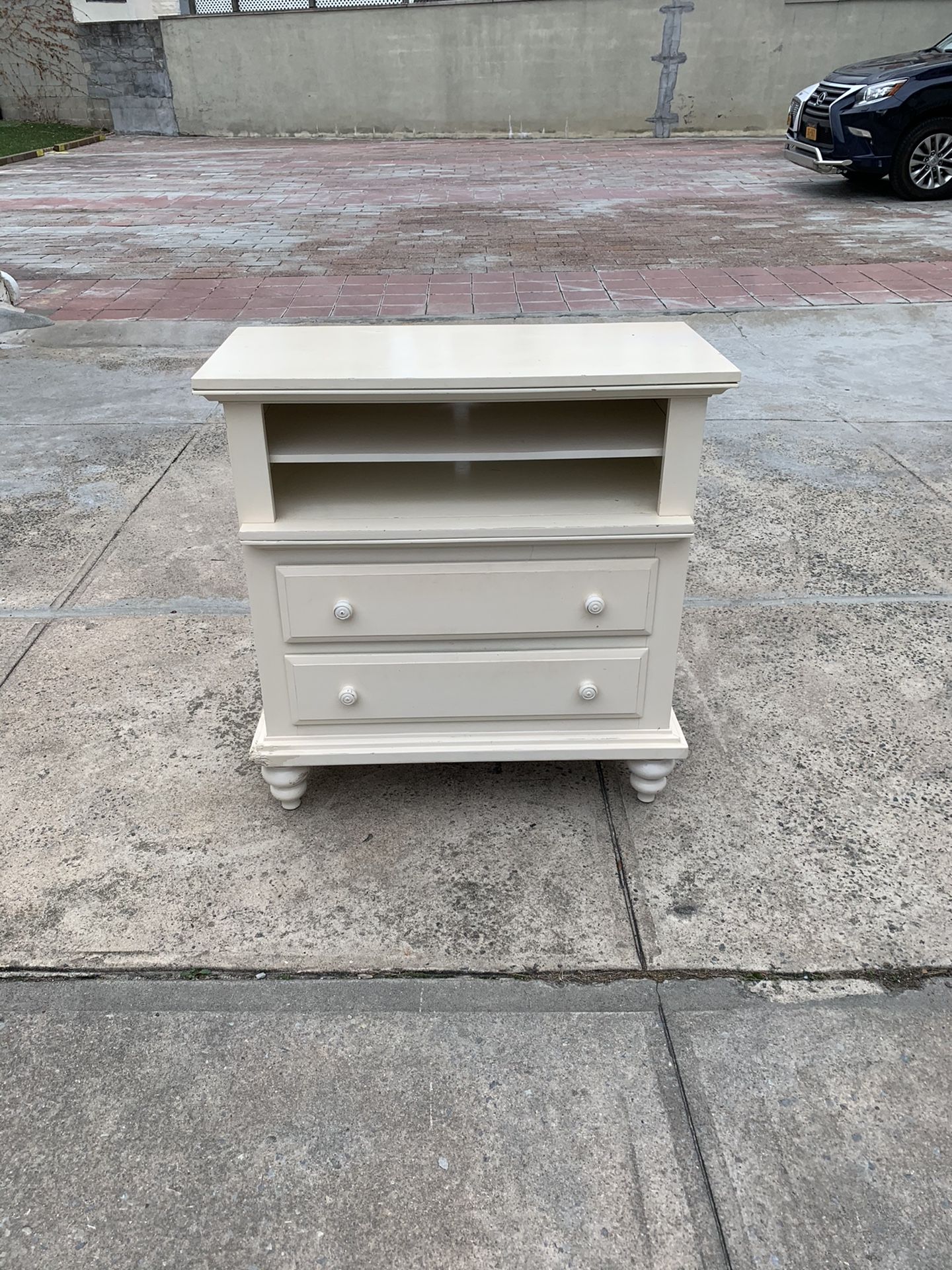 Off white wood dresser with storage shelves