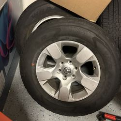 4 Ram 1500 tires with stock rim included
