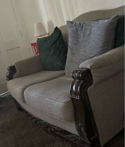 Sofa and love seat with a coffee table