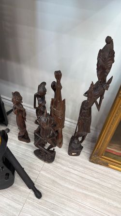 Red Wood Namast Figure