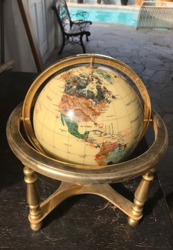 Globe, about 13 inches tall, made out of stones