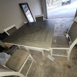 Dining room with 4 chairs.