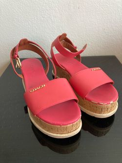 Pink Coach cork platforms
