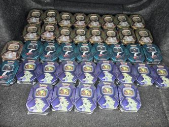 39 Triple Whammy Pokémon tins