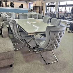 7 piece white dining table - silver chairs