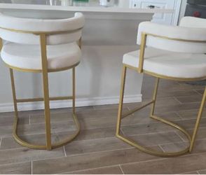 Gold and beige barstools