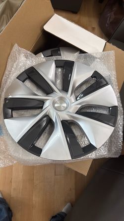 Set of (4) Tesla OEM 19” Gemini hubcaps