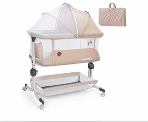 Momfann bedside bassinet (lightly used)
