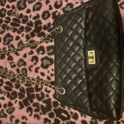 black faux leather bag