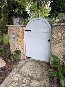 White Arched Garden Gate with Black Hardware
