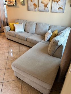 DELIVERY AVAILABLE 🚛. Beautiful Beige sectional couch from Ashley furniture