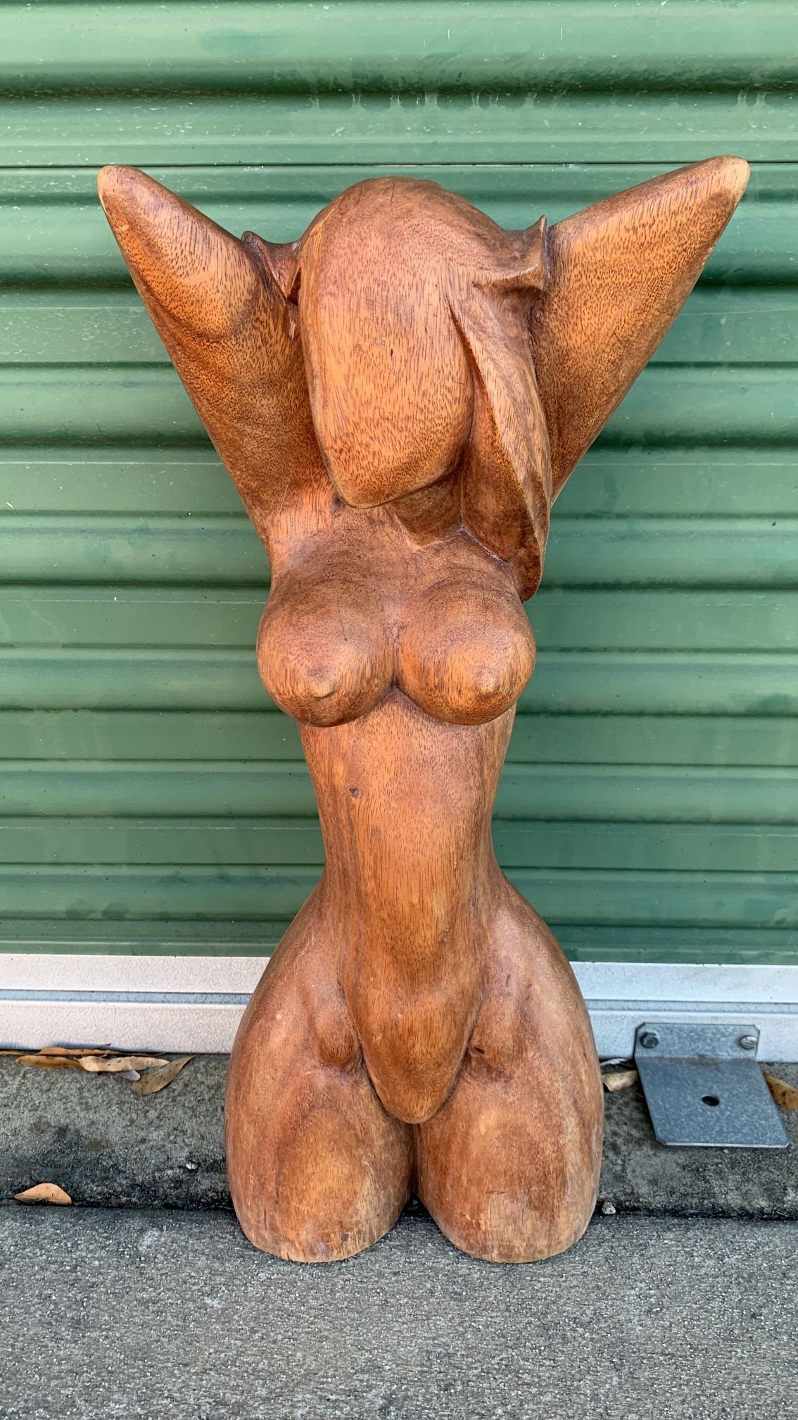 Hand carved woman sculpture