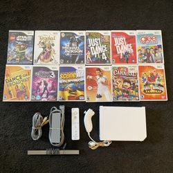 Nintendo WII Bundle with 12 GAMES 