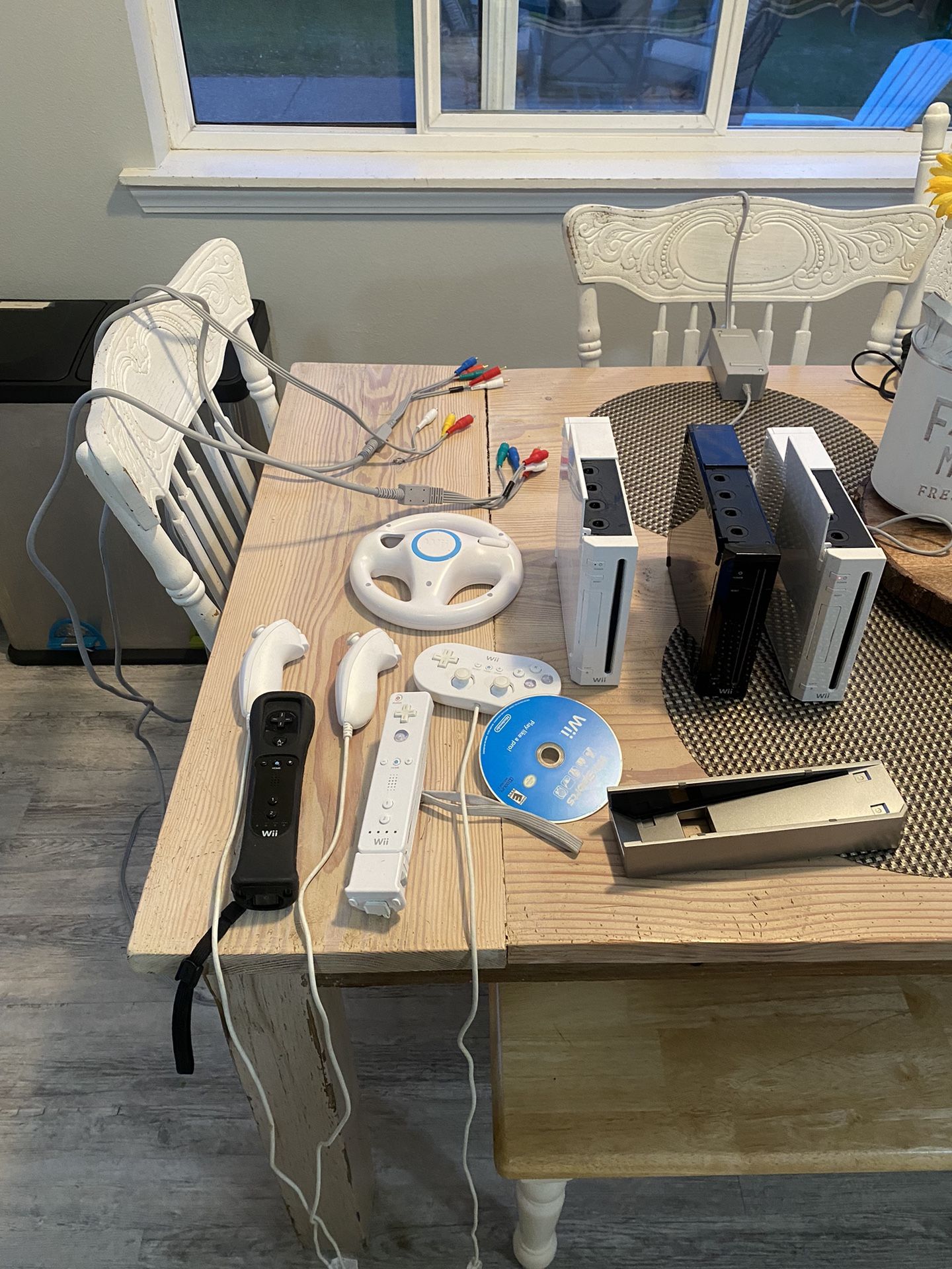 Nintendo Wii , 3 consoles, 1 power cord 1 av cable , 2 component cables, 1 game, and accessories shown. Pick up in orting