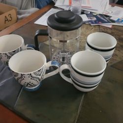 Awesome French coffee Press and 2 sets of mugs.