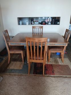 Slumberland Table and Chairs with Wayfair Rug underneath
