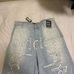 BoohooMAN blue distressed denim shorts