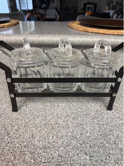 Glass containers with sspoons