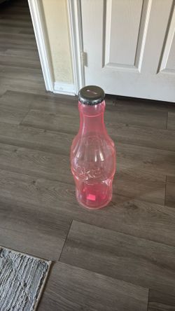 Coke bottle coin collector