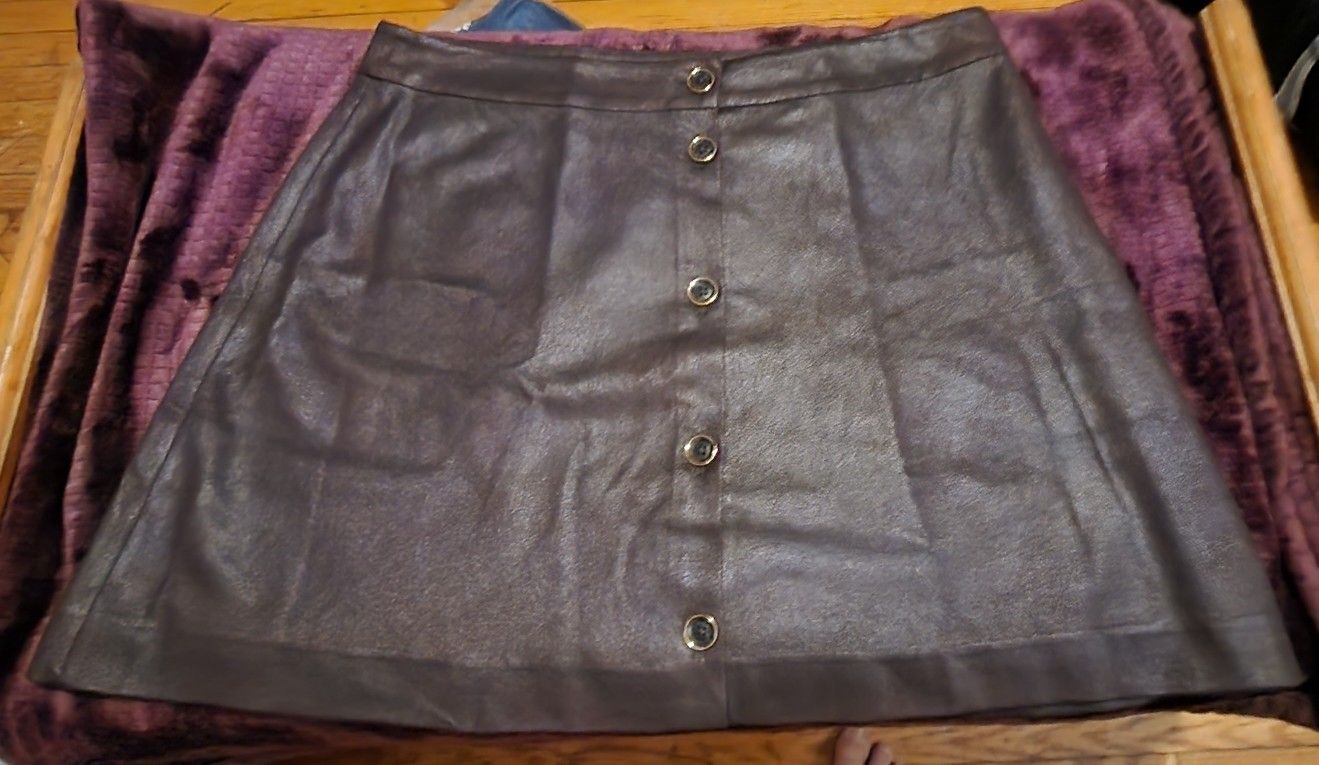 NEW Michael Kors Brown Suade Skirt. Size 12. Waist is approximately 18.25" across and 19.25" in length. Double Layered. NWOT. Absolutely Beautifu