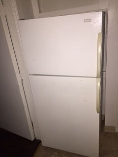 Refrigerator top freezer