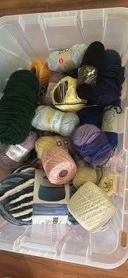 Bin of assorted yarn