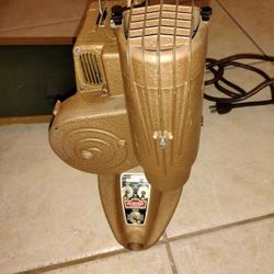 Film Projector 
Ampro 8mm V.A.8 Projector, a vintage film projector designed for 8mm film.