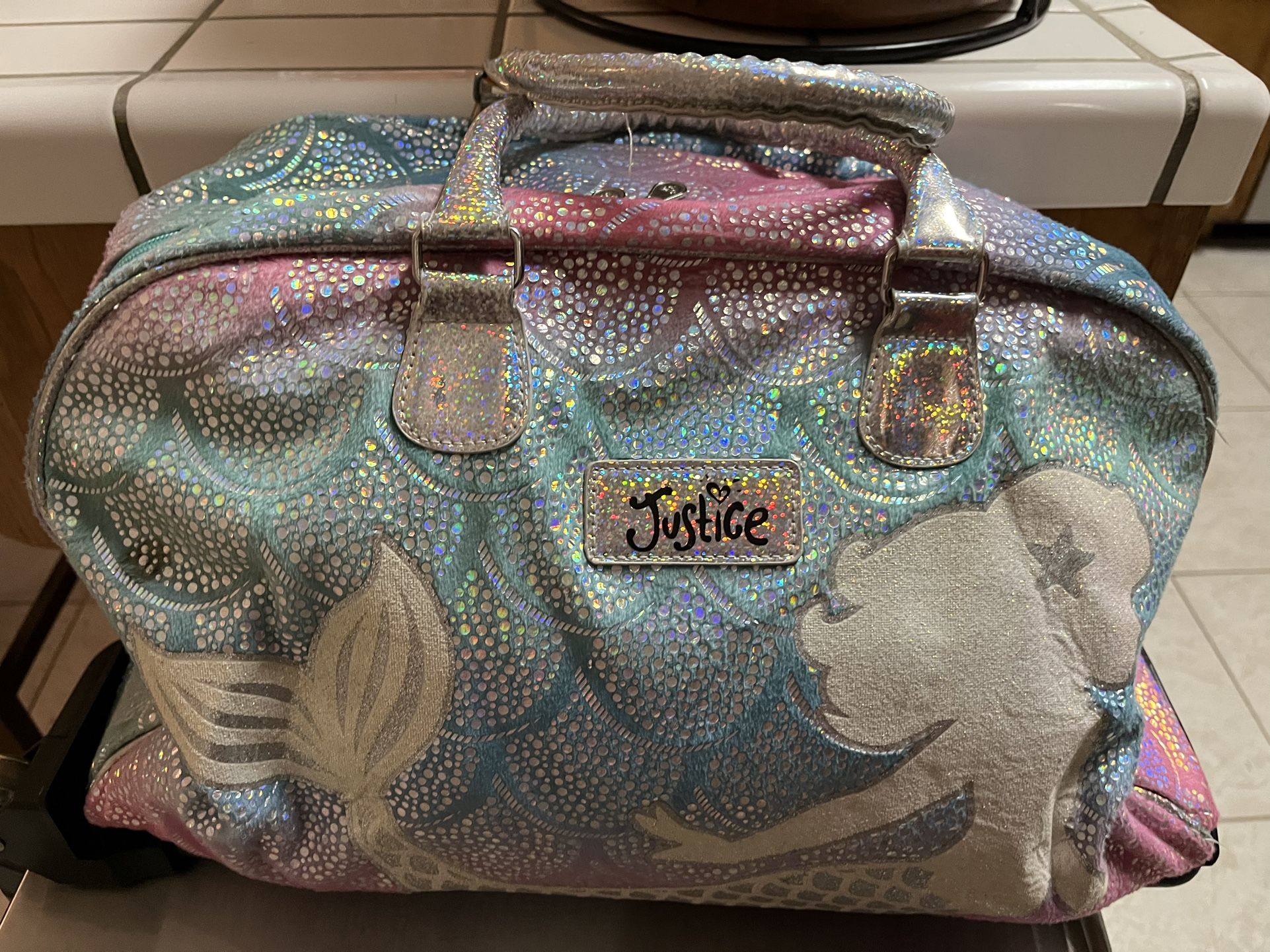Justice Mermaid Bag With Light Up Wheels.
