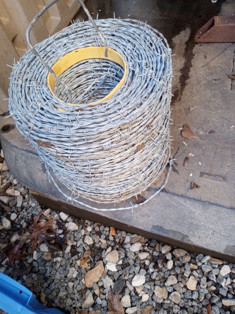 Brand New Row Of Bar Wire Fencing