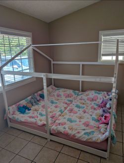 Twin bed frame (holds two mattresses)