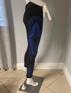 New Women’s leggings size one size New with tags Stretchy  Floral design on sides