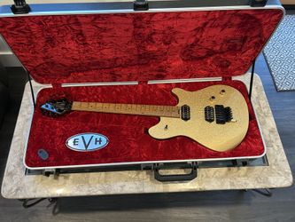 EVH Wolfgang Standard Gold Sparkle electric guitar with EVH hard case