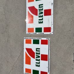 Two  7/11 Signs 