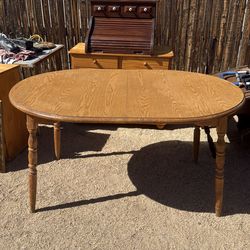 Heavy hardwood dining table $25
