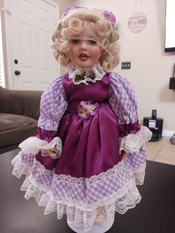 Musical porcelain doll