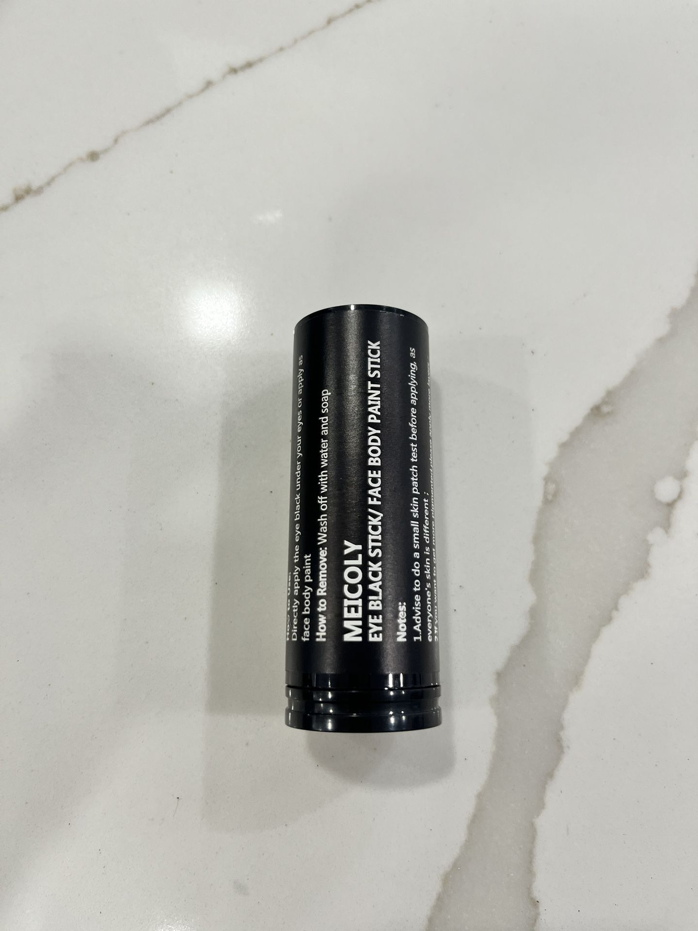 2 Eye Black sticks (orange and black)