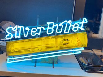 Vintage silver bullet neon sign