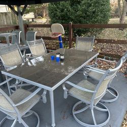 Patio Set W/ 6 Swivel Chairs 