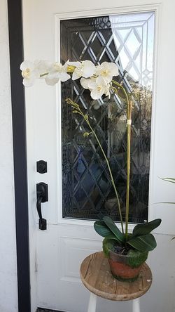 34" tall faux white orchids, pot is 5 1/2" tall, leaves 11" wide